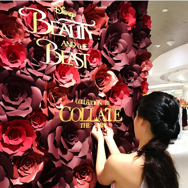 beauty and the beast paper flower wall set up papermeister